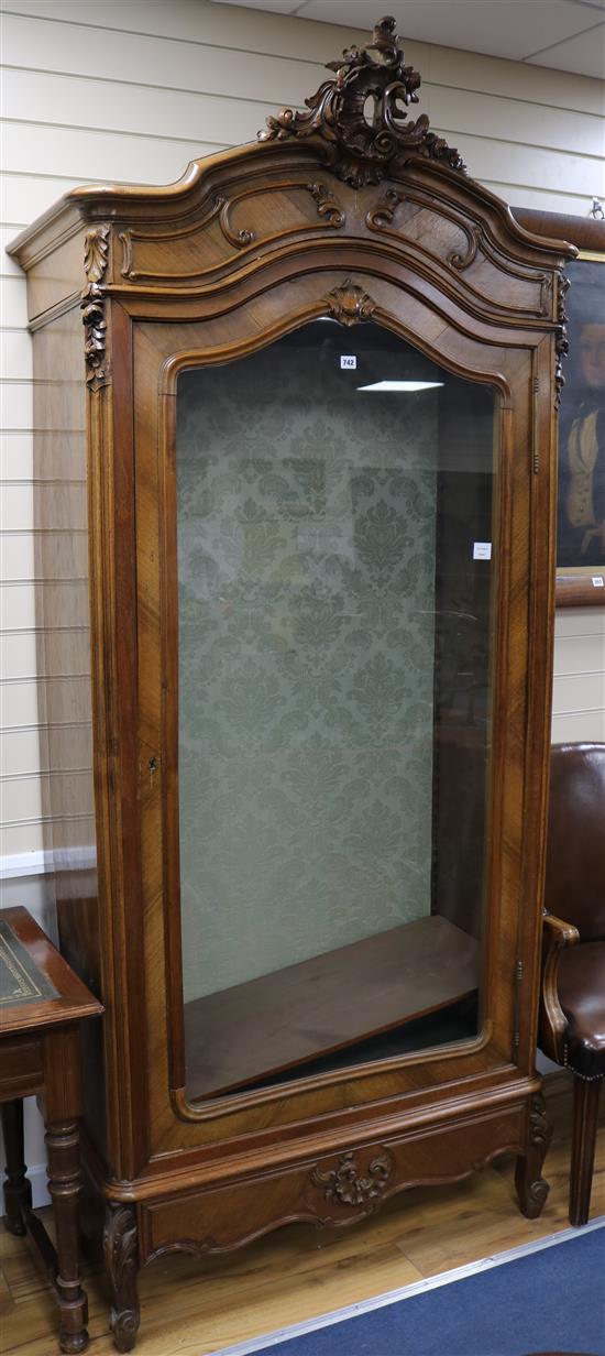 A 19th century French walnut vitrine, W.103cm H.243cm